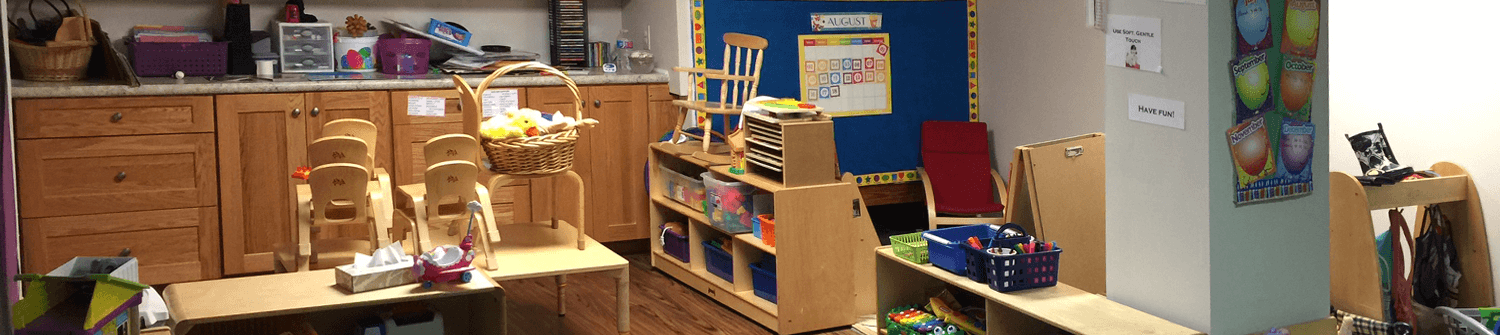 the interior of a daycare with new solid wood cherry cabinets